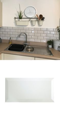 there are two pictures of the same kitchen sink and counter top, one has a clock above it