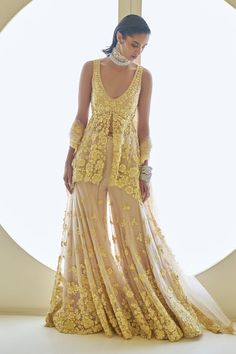 Buy Yellow Net Embroidery Sequins Deep V Flower Peplum Tunic Sharara Set For Women by Seema Gujral Online at Aza Fashions. Heavy Sharara Suit, Sangeet Board, Floral Sharara, Mirror Lehenga, Seema Gujral, Mehendi Outfit, Haldi Outfits, Haldi Outfit, Desi Outfits