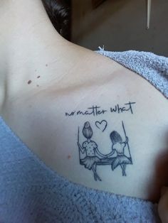 a woman with a tattoo on her shoulder that says, no matter what it is