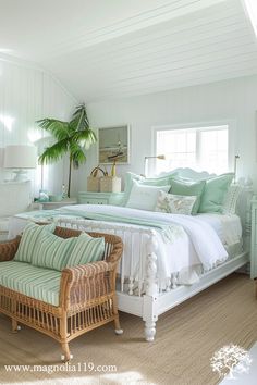 a bedroom with white walls and wood floors