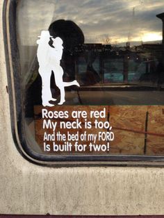 there is a sticker that says roses are red my neck is too and the bed of my ford is built for two