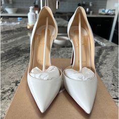 Guaranteed Authentic! Size 39, 100mm Heel Height. Only Worn A Few Times. Comes With Box, Dust Bags And Heel Taps. Luxury White Heels For Evening, Designer White Heels For Office, Designer White Office Heels, Luxury White Heels, Designer White Heels For Formal Occasions, Designer White Formal Heels, Christian Louboutin Iriza, Heel Taps, Heel Tap