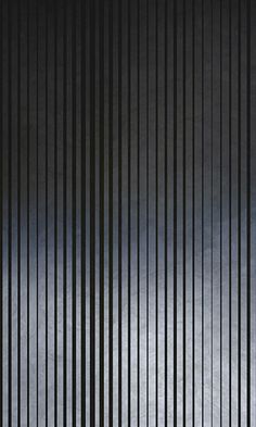 an abstract black and white background with vertical lines