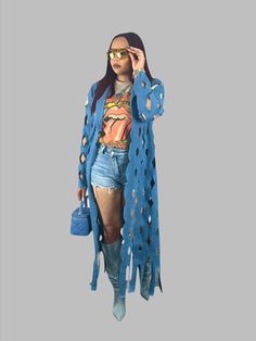 The Diva Denim Duster embodies elegance for any fashion-forward individual. Its intricate cut-out design adds a touch of sophistication and allure. The serene blue color evokes a sense of tranquility while still making a bold fashion statement. With a relaxed fit for ultimate comfort, this duster is the perfect option for any occasion. Simply pair it with your favorite outfit to instantly elevate your look. Color may vary due to lighting. Model Measurements Model is wearing a medium (usually wea Womens Denim Duster, Urban Long Sleeve Denim Outerwear, Blue Duster Cardigan, Multi Colored Duster, Patchwork Denim Duster, Denim Cardigan, Denim Duster, The Diva, Jacket Denim