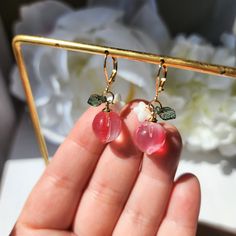 Our lovely opaque peach earrings are made with glass peaches, glass flowers, acrylic leaves and 14k gold plated hooks which are good for delicate ears. Size: The stud style(W x L ): 0.6" x 1" the hook style( W x L ): 0.6" x 1.5" the Lever Back style( W x L ): 0.6" x 1.5" Peach Earrings For Summer Gift, Pink Flower Earrings With Resin And Ear Wire, Pink Resin Flower Earrings With Ear Wire, Peach Food, Acrylic Leaves, Color Durazno, Rain Design, Flowers Acrylic, Peach Earrings