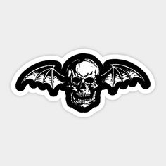 a sticker with a skull and bat wings on the back of it's head