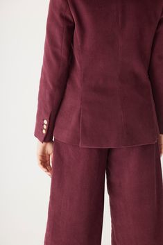 This double pocket blazer is the epitome of cool. Cut similarly to our classic Bianca Blazer, the Tilda is a little shorter for a slightly shrunken silhouette. In our crisp yet supple cotton corduory in rich jewel tones, it pairs perfectly with the Amandine pant for a suiting look, but also gives a touch of polished sophistication to just about any outfit. Product Details: Tailored jackets Slightly shrunken fit Mother of pearl button closure and cuff Double Pocket Partially lined 100% Cotton Dry Cotton Blazer With Notch Lapel And Button Cuffs, Tailored Cotton Blazer With Button Cuffs, Cotton Blazer With Button Cuffs For Business Casual, Business Casual Cotton Blazer With Button Cuffs, Fall Cotton Blazer With Double Button Closure, Cotton Blazer With Double Button Closure For Office, Cotton Suit For Workwear In Fall, Fit Mother, Rich Jewel Tones