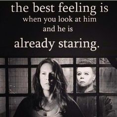 a woman standing in front of a window with two men behind her and the caption reads, the best feeling is when you look at him and he is already staring