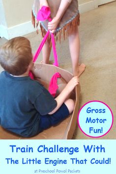 two children playing in a cardboard boat on the floor with text overlay reading gross motor fun train challenge with the little engine that could