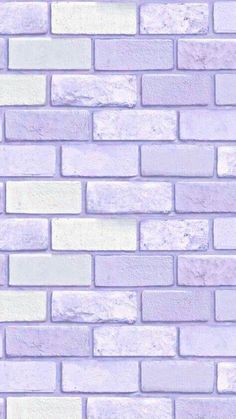 a white brick wall that is very light purple and has no mortars or mortars on it