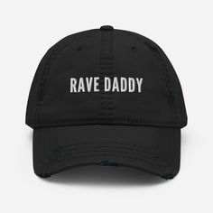 Festival season is always just around the corner. Pick up this essential rave daddy distressed dad hat and show up in style to whatever event. Music festivals require essential gear. This is a perfect dad hat for the occasion. The rave daddy hat will impress and tickle the funny bone of everyone around you. Rock it, rave it, embody the rave daddy at the next music festival you attend.  * 100% pre-shrunk cotton twill * Soft crown * 6-panel unstructured cap with a low profile * Adjustable hook and loop closure Music Festivals, The Funny, You Rock, Dad Hat, Bones Funny, Trucker Cap, Festival Season, Music Festival, Dad Hats