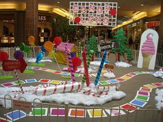 an ice cream parlor decorated for christmas with candy canes and decorations in the store