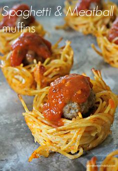 spaghetti and meatball muffins with sauce on top are ready to be eaten