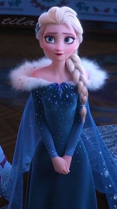 the frozen queen is wearing a blue dress