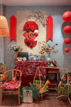 the room is decorated with red lanterns and decorations