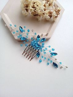 Crystal teal hair comb - will be an excellent addition to the bride's hairstyles.  The aquamarine hair comb is flexible: will work great with many bridal hairstyles: classic updo, half up half down, french twist, mermaid braids, high bun and others. The width of the ridge is approximately 6.5 inches (16 cm). Earring Length: 3 inches (7.5 cm). Great gift for bridesmaids!  Turquoise hair piece are packaged in individual gift boxes. ANY combination of crystal rhinestones and beads!  * All orders from the Exclusive Wedding Shop you will receive in a FREE beautiful gift box. * Standard shipping: - USA: 12-15 business days - Europe: 3-5 weeks - Canada: 6-10 weeks - Australia: 6-10 weeks - Rest of World: 4-10 weeks * Express shipping UPS: 7-9 business days (around the world). If you have any ques Aquamarine Hair, Diy Hair Pieces, Mermaid Braids, Teal Bridesmaid, Hair Piece Wedding Hair, Mermaid Braid, Classic Updo, Hair Piece Wedding, Aqua Hair