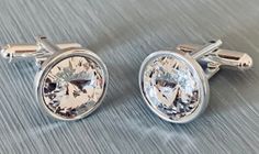 These stunning cufflinks are handmade with 925 Sterling Silver and Swarovski Chatons.  Many colours also available, these make perfect gifts for birthdays, anniversary's and weddings Alternatively a perfect gift for your Groom with Swarovski's matching the colour theme of your wedding Crystal is the gift for 15th Wedding Anniversary. Makes a great Father's day Gift Please enquire for other colours Elegant White Gold Cufflinks As Gift, Silver Round Cufflinks For Anniversary, White Gold Cufflinks For Anniversary, Anniversary White Gold Cufflinks, Modern Cufflinks As A Gift, Modern Clip-on Jewelry For Gifts, Modern Clip-on Jewelry As Gift, Silver Adjustable Cufflinks For Anniversary, Silver Sterling Silver Cufflinks For Wedding