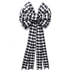 a black and white checkered bow on a white background