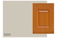 an image of a wooden cabinet door with the bottom panel painted light brown and the bottom panel is off white