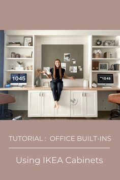 a woman sitting on top of a desk in an office