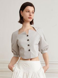 This is a modern and feminine top by yyiam that is made out of high quality and sturdy fabric. With unique design detail and trendy mood, you can style it for your clean and casual daily outfit.- Puff detail on the sleeves- Unique neckline detail- Four button closure on the front Hacks Clothes, Feminine Top, Fashion Hacks, Fashion Hacks Clothes, Crop Shirt, Daily Outfits, Design Details, Unique Design, Top Shirt