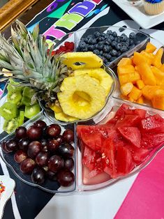 there is a platter of fruit on the table