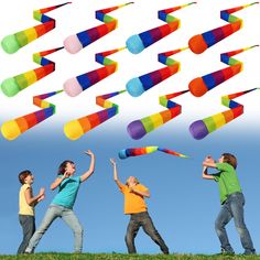 four children are playing with colorful kites in the sky