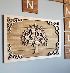 a wooden wall hanging on the side of a wall