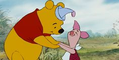 winnie the pooh and piglet are touching each other