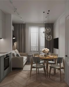 a living room and dining area are shown in this modern style apartment with wood flooring