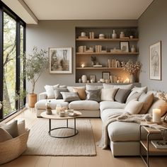 a living room filled with lots of furniture next to a large glass window covered in candles