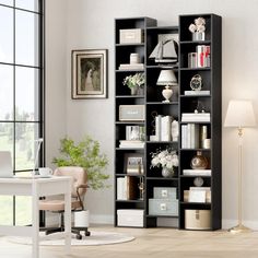 a living room filled with furniture and a white table in front of a large window