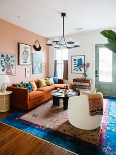 a living room filled with furniture and decor