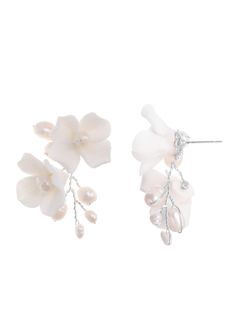 two pairs of earrings with white flowers and pearls