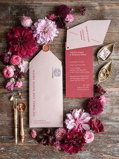 the wedding stationery was done in pink and red