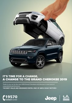 a jeep ad with a hand holding a remote control in the shape of a car