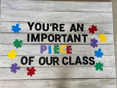 a sign that says you're an important piece of our class on wood planks