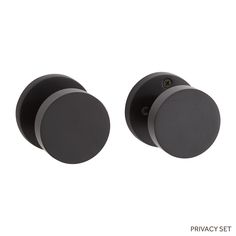 two black round knobs on a white background with the words privacy set above them