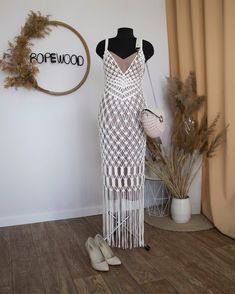 Macrame dress. Modern silhouette, boho touch, perfect for the all occasions. You can wear it on simple top or bikini or sleep dress. Handmade with soft cotton blend round knitted rope. S-L size (custom orders for other sizes are available). Measures approx. 120 cm from top of shoulder to bottom of fringe (other length by request). The price includes only the macrame dress. * Made to order. * Each item is made to order, so please allow for minor variations in length and appearance. If you have any questions about this item feel free to shoot me a message! Macrame Clothes, Boho Chique, Macrame Knots Pattern, Macrame Dress, Boho Chic Dress, Handmade Dress, Festival Clothing, Dress Beach, Dress Boho