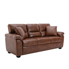 a brown leather couch with pillows on it