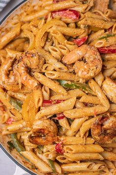 pasta with shrimp and peppers in a skillet