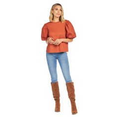 The Aurora Rust Puff-Sleeve Top is effortlessly stylish. The cotton jersey top features cotton poplin balloon short sleeves. The top measures approximately 23" from shoulder to hem on size small. The dramatic sleeves add a stylish touch to this classic top, available in black, rust and cream. | Mud Pie Women's Aurora Rust Puff-Sleeve Top in Orange, Size Large | 100% Cotton Fitted Puff Sleeve Top In Solid Color, Trendy Puff Sleeve Crop Top, Fitted Solid Color Puff Sleeve Top, Fall Short Sleeve Blouse With Pleated Sleeves, Trendy Long Sleeve Puff Sleeve Top, Padded Puff Sleeve Top For Fall, Fall Puff Sleeve Padded Top, Trendy Solid Puff Sleeve Top With Balloon Sleeves, Trendy Puff Sleeve Top With Balloon Sleeves