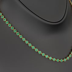 Adorn her with timeless elegance with our 9.36 Carat Natural Emerald Choker Necklace in 14K Gold. This bezel-set, round-cut art deco design showcases the vibrant May birthstone, making it a perfect customized birthday gift for her. Exuding luxury and sophistication, this stunning necklace is a refined statement piece crafted to celebrate life’s special moments. 𝐅𝐞𝐚𝐭𝐮𝐫𝐞𝐬:• 𝐌𝐚𝐝𝐞 𝐭𝐨 𝐎𝐫𝐝𝐞𝐫• 𝐌𝐞𝐭𝐚𝐥: 𝟏𝟎𝐊 𝐆𝐨𝐥𝐝 | 𝟏𝟒𝐊 𝐆𝐨𝐥𝐝 | ��𝟏𝟖𝐊 𝐆𝐨𝐥𝐝 • 𝐁𝐚𝐧𝐝 𝐂𝐨𝐥𝐨𝐫𝐬: Ro Emerald Choker, Customised Birthday Gifts, Stacked Wedding Rings, Choker Necklace Set, Celebrate Life, May Birthstone, Birthstone Gifts, Engagement Rings Oval, Birthday Gift For Her