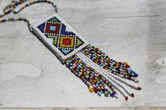 SUMMER SALE Ethnic Beaded Necklace Colorful by HeriniaJewelry Handmade Multicolor Pendant Beads, Handmade Colorful Traditional Beaded Necklaces, Traditional Handmade Colorful Beaded Necklaces, Bohemian Rectangular Beaded Necklaces For Festivals, Colorful Handmade Traditional Beaded Necklace, Multicolor Beaded Rectangular Necklace, Bohemian Rectangular Beaded Necklaces, Traditional Handmade Colorful Beaded Necklace, Multicolor Beaded Necklace With Pendant