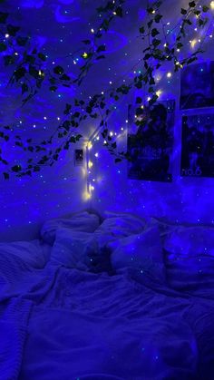 a bedroom with blue lights on the ceiling