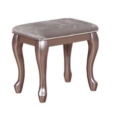 a small stool with a silver velvet seat cover on the bottom and legs, against a white background