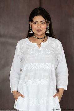 FATIMA CHIKAN HANDICRAFT Present  There is no comparison of traditional craftsmanship of Lucknowi Chikankari work. This designer collection is finely and neatly embroidered with traditional white colour threads on all over Design/ Front Design. You will find a Great kurti combination of fabric and applique work, to obtain a unique design and distinct skill of the embroiderer. Kurti Fabric :Cotton dyeable Sleeves : 3/4 Sleeves Style : Short Top Length : 34-36 Inches Occasions : Party Wear, Office Kurti Combination, Chikankari Work, Lucknowi Chikankari, Applique Work, All Over Design, Sleeves Style, White Colour, Front Design, Festival Wear