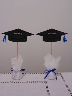 two graduation hats on top of each other