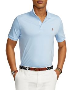 Ralph Lauren debuted his original Polo shirt in 1972, and today the iconic design is offered in a wide array of colors and fits. This heathered version is made from smooth cotton interlock and cut for a roomy silhouette. Office Blue, Cotton Polo Shirt, Menswear Collection, Cotton Polo, Classic American, Heritage Brands, Polo Ralph Lauren Mens, Polo Collar, Mens Polo Shirts