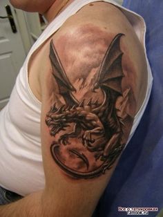 a man with a dragon tattoo on his arm